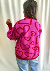 CÁRDIGAN CORAZONES FUCSIA ROJO
